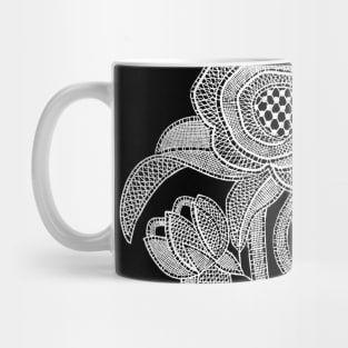 embroidery image with fabric and threads forming a stylized black and white flower branch Mug